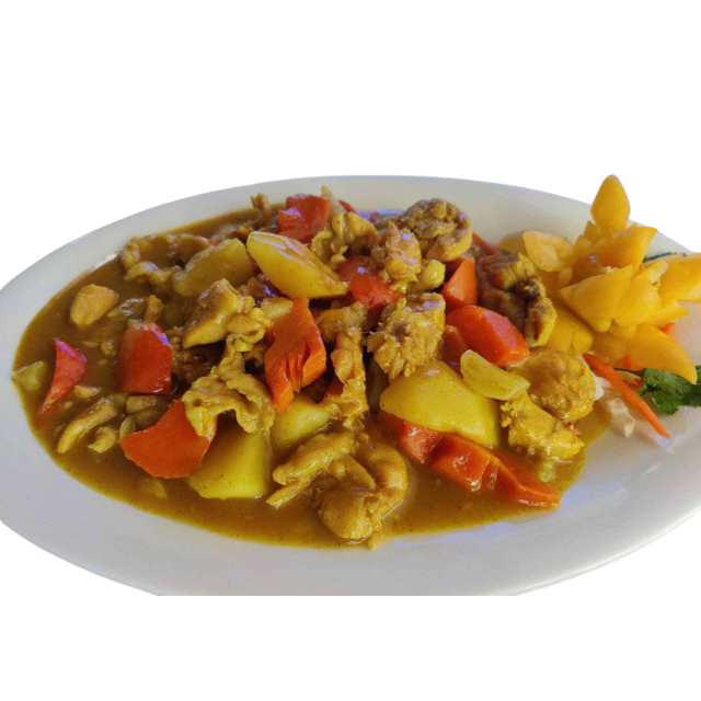 Filipino-style chicken curry with vegetables on a plate.