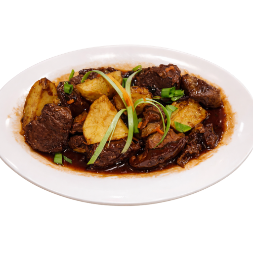 Beef caldereta stew with potatoes in rich sauce.