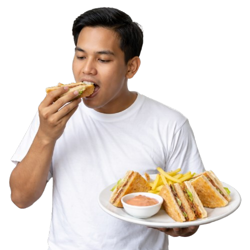 Customer eating a sandwich with fries and dipping sauce.