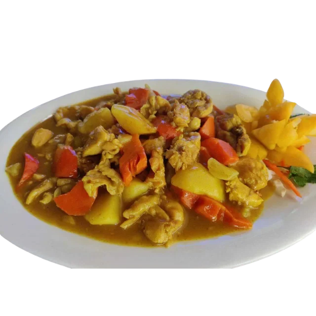 Filipino-style chicken curry with vegetables on a plate.
